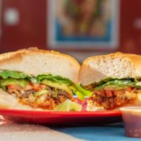 Torta · Bread, mayo, meat of choice, avocado, lettuce, tomato, onions (raw or grilled). Add queso or...