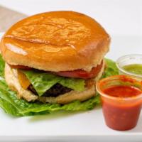 Cheeseburger · Beef patty, mayo, slice of ham, tomato, lettuce, onion (raw or grilled) cheese American or S...