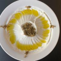 Labneh · Lebanese strained yogurt drizzled with extra virgin olive oil and za’atar.