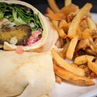 Falafel Wrap · Crushed chickpea patties, seasoned and fried, with lettuce, tomatoes, cucumbers, radish, and...