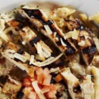 Bacon Chicken Ranch Alfredo · Bacon chicken ranch alfredo our original alfredo sauce tossed with penne pasta and crisp dic...