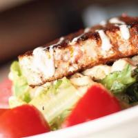 Chicken Caesar Salad · With our homemade dressing, romaine lettuce, tomatoes, croutons and parmesan.