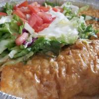 Chimichanga Dinner · Choice of soft or fried chimichanga. 2 flour tortillas deep-fried, filled with shredded beef...
