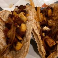 Tacos Al Pastor Dinner · 3 corn tortillas stuffed with marinated grilled pork, onions, and pineapple. Served with ric...