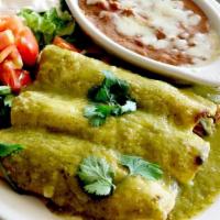 Enchiladas Verdes · 3 chicken or beef enchiladas topped with green tomatillo sauce and cheese. Side of lettuce, ...