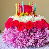 Your Wish Is Granted Birthday Cake Bouquet  · Sweet as a birthday cake, this creative, colorful bouquet of roses and mums, topped with bir...
