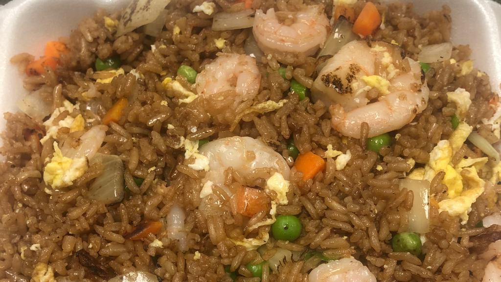 Shrimp Fried Rice · Served with white onions and greens onions.