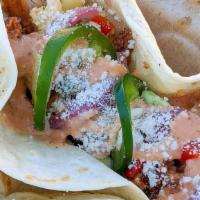 Dasher Chicken Tacos · Buttermilk Fried Chicken, Dash Sauce, Pineapple Salsa, Pickled Onions, Jalapeños, Cotija, Fl...
