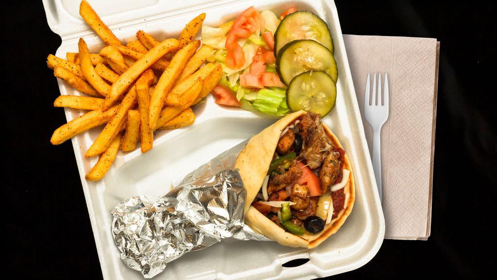 Chicken Pizza Pita · Our chicken shawarma grilled with olives, tomatoes, onions, green peppers, Italian seasoning wrapped in a toasted pita lathered with our pizza sauce and mozzarella. Served with seasoned fries, small salad, & drink.