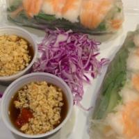 Summer Roll (2 Rolls) · Two rolls filled with green leaf lettuce, fresh basil, cucumber, and shrimp accompanied with...