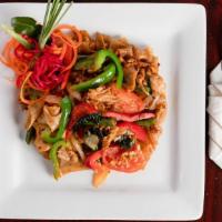 Drunken Noodle · Stir fried Flat rice noodle with combination of green beans, tomatoes, basil, egg, onions an...