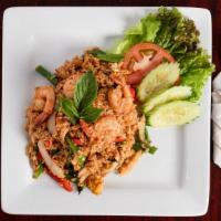Fried Rice · Egg, white onions, peas, carrot, scallion, and your choice of meat stir fried with Thai Jasm...