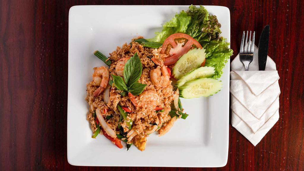 Fried Rice · Egg, white onions, peas, carrot, scallion, and your choice of meat stir fried with Thai Jasmine rice.
