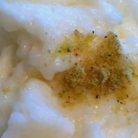 Rice Pudding · Made with milk and basmati rice.