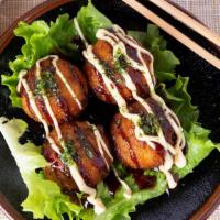 Tako Yaki · Fried octopus ball, tonkatsu and mayo sauce.