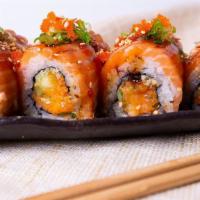 Salmon Madness · Spicy salmon, cucumber, crunchy, salmon on top lightly seared. Seven spice, ponzu, masago, g...