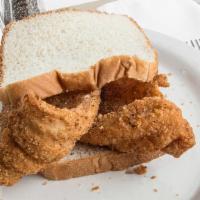 Fish Sandwich · Sandwich made with a piece of cut fish that is either fried baked or grilled.