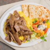 Gyro Plate · Gyro served with rice and salad and pita bread.