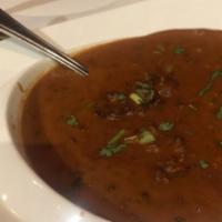 Dal Bukhara · Chef Special black lentil simmered overnight till perfection.