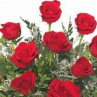 Classic Dozen Roses Red Rose Arrangement · Standard. Let us deliver a beautiful surprise for you today! This vase of 12 brilliant red r...