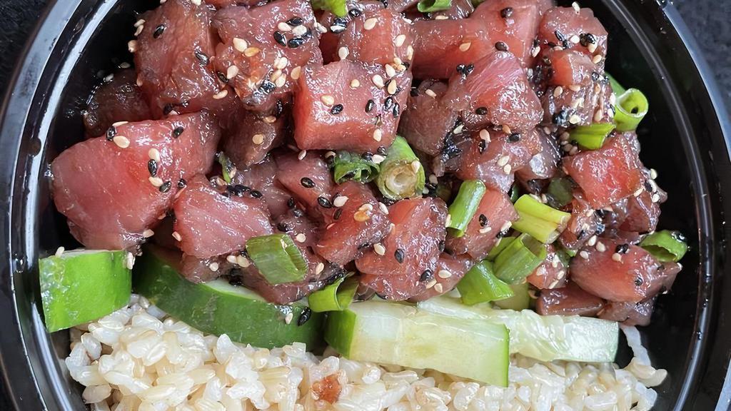 G. Served W Sushi Rice · The original gangster tuna, shoyu, sesame oil, green onion, sesame seeds and sushi rice