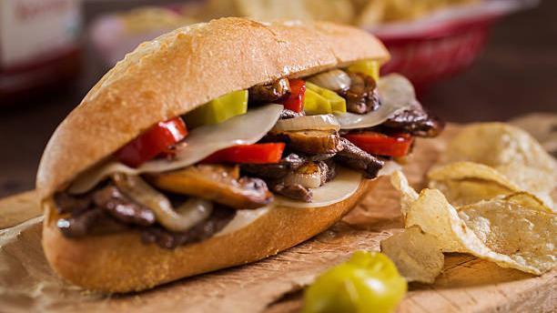 Mushroom Chicken Cheesesteak · Sliced chicken, melted cheese, grilled onions, sauteed mushrooms, hoagie roll.