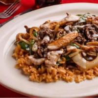 Happy Plate · Grilled chicken and steak with onions and bell peppers. Served on bed of rice, topped with c...