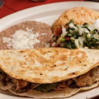Quesadilla Mexicana · Grilled quesadilla filled with your choice of meat, steak, chicken or shrimp with onions and...