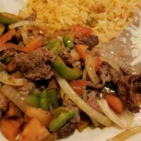 Carne Picada · Grilled steak or tender chicken cooked with chopped onions, tomatoes and bell peppers. Serve...