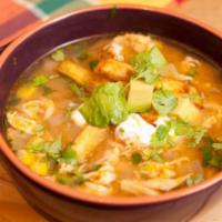 Tortilla Chicken Soup · Chicken broth served with rice, diced avocado and pico de gallo.