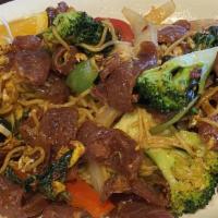 Drunken Egg Noodles · Bell peppers, basil, broccoli, and onions, stir fried in brown house sauce.