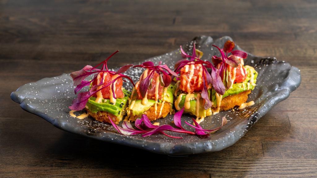 Crispy Spicy Tuna · Crispy hashbrown, spicy tuna, avocado, spicy aioli, microgreen. This item is served using raw or undercooked ingredients. Consuming raw or undercooked meats, poultry, seafood, shellfish or eggs may increase your risk of foodborne illness.