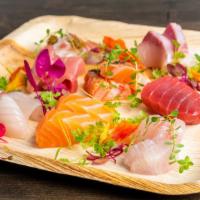 Sashimi Tasting* · Chef choice of 16pcs sashimi (8 Different cut of fishes). This item is served using raw or u...