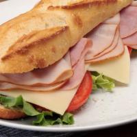 Ham & Turkey · Ham and Turkey with one choice of cheese: provolone, swiss, or american.  Served with lettuc...