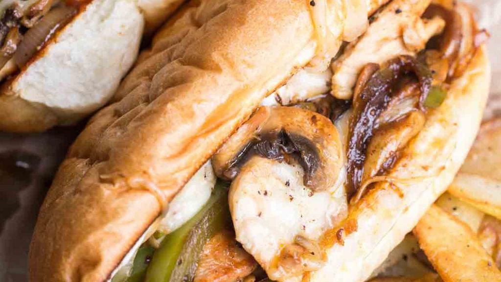 Chicken Philly · Grilled Chicken with green peppers, onion and mushroom topped with provolone cheese. Served on toasted, buttery bread.
