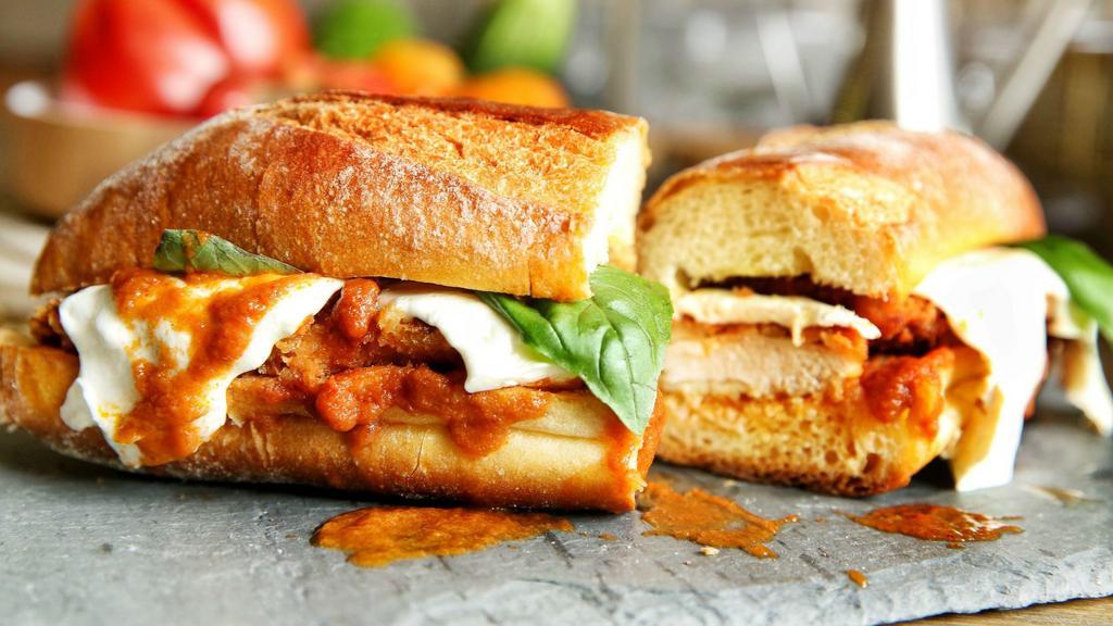 Chicken Parmesan · Toasted bread with chicken topped with marinara sauce and provolone cheese. Served on buttery, toasted bread.
