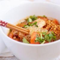 Tom Yum Soup · Spicy. Spicy and sour soup with mushroom, tomato, green onion, cilantro, and lime juice. Add...