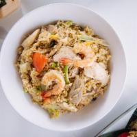 Combination Fried Rice · Jasmine rice with pork, beef, chicken, shrimp, egg, onion, green onion, and tomato.