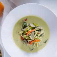Green Curry · Spicy. Green curry and coconut milk served with your choice of meats, bamboo shoots, carrot,...