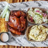 Smoked Chicken Wings Plate · Jumbo smoked wings, fried and lightly coated in a house-made wing sauce served with celery a...