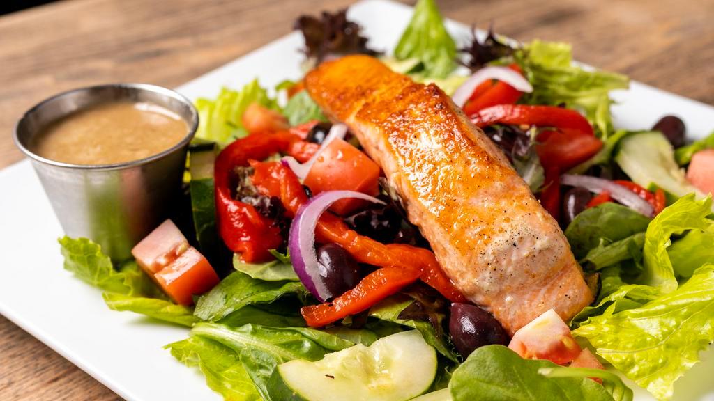 Salmon & Roasted Pepper · Wild Alaskan salmon (when in season) atop mixed greens, our own roasted red peppers, tomato, kalamata, cucumber with spicy fire roasted pepper dressing on side