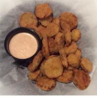 Pickled Paw Prints · A generous portion of our fried dill pickle chips seasoned then served with a creamy smoked ...