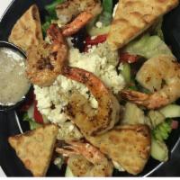 Greek Salad · Crisp mixed greens tossed with kalamata olives, feta cheese, roasted red peppers, marinated ...