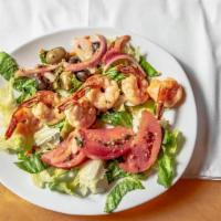 Shrimp Skewer · A full skewer of large shrimp grilled and brushed with our garlic sauce.