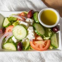 Greek Salad · Vegan. Gluten free. Tomatoes, Feta Cheese, Kalamata Olives, Onions, and Cucumbers on Romaine...