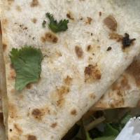 Quesadilla · Large tortilla with our 3 vegan cheese, grilled mixed veggies, and your choice of protein (s...