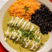 Chicken Enchiladas · Corn tortillas filled with tender, moist, pulled chicken breast meat. Topped with a tomatill...