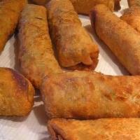 Chicken Egg Roll · Crispy dough filled with minced vegetables.