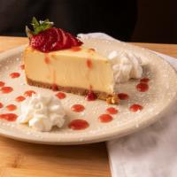 Ny Cheese Cake · Original cheese cake with fresh berries, wild berry glaze topped with whipped cream.
