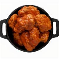 Boneless Wings · Classic boneless wings oven-baked, cooked to order perfectly crisp, tossed with your choice ...